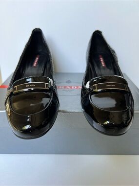 Prada Black Patent Leather Loafers with Logo Bar